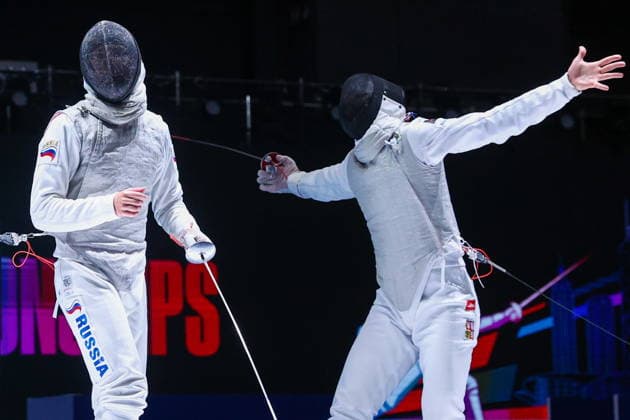 CHINA, HONG KONG - JULY 25, 2026: Russia s Yegor Barannikov (L) and the Czech Republic s Alexander Choupenitch compete in the men’s individual foil event at the 2026 Kerry Fencing World Championships. Mikhail Sinitsyn TASS  95428025