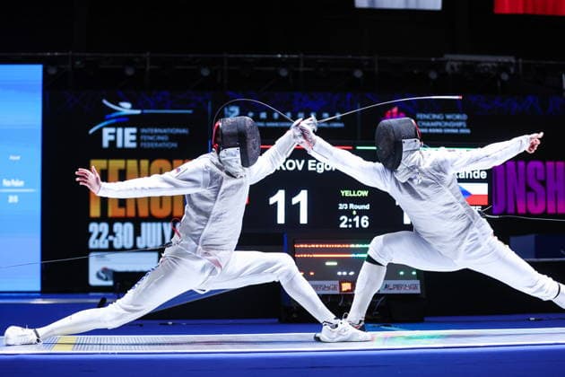 CHINA, HONG KONG - JULY 25, 2026: Russia s Yegor Barannikov (L) and the Czech Republic s Alexander Choupenitch compete in the men’s individual foil event at the 2026 Kerry Fencing World Championships. Mikhail Sinitsyn TASS  95428027