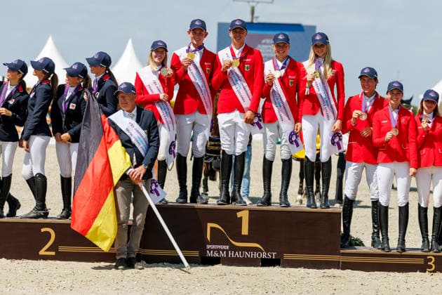 HAGEN a.T.W. - FEI Jumping European Championship, EM, Europameisterschaft Children, Juniors and Young Rider 2026, HAGEN a.T.W. - FEI Jumping European Championship Children, Juniors and Young Rider 2026 Team Germany TILLMANN Lennard (GER), STORMANNS Tony (GER), MERSCHFORMANN Malte (GER), BEERBAUM Brianne (GER), KUEHNER Jolie Marie (GER), SEEMANN Eberhard (Chef dÂ Equipe) Championship ceremony Team Final Nations Cup CH-EU-J-S - Juniors 2nd COMPETITION Teams & Individuals over two rounds - SECOND ROUND Hagen a.T.W., Reitanlage Haunhorst 25. July 2026 - *** HAGEN a T W FEI Jumping European Championship for Children, Juniors, and Young Riders 2026, HAGEN a T W FEI Jumping European Championship for Children, Juniors, and Young Riders 2026 Team Germany: Lennard TILLMANN (GER), Tony STORMANNS (GER), Malte MERSCHFORMANN (GER), Brianne BEERBAUM (GER), KUEHNER Jolie Marie GER, SEEMANN Eberhard, Chef d’Equipe Championship Ceremony Team Final Nations Cup CH EU J S Juniors 2nd COMPETITION Teams Individuals over two rounds SECOND ROUND Hagen a T W, Haunhorst Equestrian Center, July 25, 2026