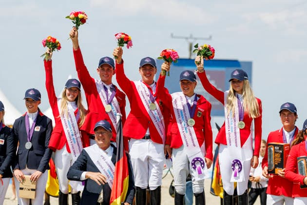 HAGEN a.T.W. - FEI Jumping European Championship, EM, Europameisterschaft Children, Juniors and Young Rider 2026, HAGEN a.T.W. - FEI Jumping European Championship Children, Juniors and Young Rider 2026 Team Germany TILLMANN Lennard (GER), STORMANNS Tony (GER), MERSCHFORMANN Malte (GER), BEERBAUM Brianne (GER), KUEHNER Jolie Marie (GER), SEEMANN Eberhard (Chef dÂ Equipe) Championship ceremony Team Final Nations Cup CH-EU-J-S - Juniors 2nd COMPETITION Teams & Individuals over two rounds - SECOND ROUND Hagen a.T.W., Reitanlage Haunhorst 25. July 2026 - *** HAGEN a T W FEI Jumping European Championship for Children, Juniors, and Young Riders 2026, HAGEN a T W FEI Jumping European Championship for Children, Juniors, and Young Riders 2026 Team Germany: Lennard TILLMANN (GER), Tony STORMANNS (GER), Malte MERSCHFORMANN (GER), Brianne BEERBAUM (GER), KUEHNER Jolie Marie GER, SEEMANN Eberhard, Chef d’Equipe Championship Ceremony Team Final Nations Cup CH EU J S Juniors 2nd COMPETITION Teams Individuals over two rounds SECOND ROUND Hagen a T W, Haunhorst Equestrian Center, July 25, 2026