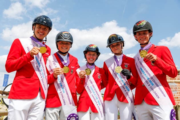 HAGEN a.T.W. - FEI Jumping European Championship, EM, Europameisterschaft Children, Juniors and Young Rider 2026, HAGEN a.T.W. - FEI Jumping European Championship Children, Juniors and Young Rider 2026 Team Germany TILLMANN Lennard (GER), STORMANNS Tony (GER), MERSCHFORMANN Malte (GER), BEERBAUM Brianne (GER), KUEHNER Jolie Marie (GER), SEEMANN Eberhard (Chef dÂ Equipe) Championship ceremony Team Final Nations Cup CH-EU-J-S - Juniors 2nd COMPETITION Teams & Individuals over two rounds - SECOND ROUND Hagen a.T.W., Reitanlage Haunhorst 25. July 2026 - *** HAGEN a T W FEI Jumping European Championship for Children, Juniors, and Young Riders 2026, HAGEN a T W FEI Jumping European Championship for Children, Juniors, and Young Riders 2026 Team Germany: Lennard TILLMANN (GER), Tony STORMANNS (GER), Malte MERSCHFORMANN (GER), Brianne BEERBAUM (GER), KUEHNER Jolie Marie GER, SEEMANN Eberhard, Chef d’Equipe Championship Ceremony Team Final Nations Cup CH EU J S Juniors 2nd COMPETITION Teams Individuals over two rounds SECOND ROUND Hagen a T W, Haunhorst Equestrian Center, July 25, 2026