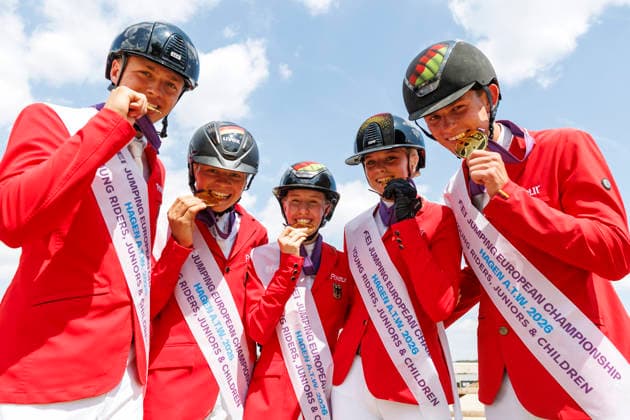 HAGEN a.T.W. - FEI Jumping European Championship, EM, Europameisterschaft Children, Juniors and Young Rider 2026, HAGEN a.T.W. - FEI Jumping European Championship Children, Juniors and Young Rider 2026 Team Germany TILLMANN Lennard (GER), STORMANNS Tony (GER), MERSCHFORMANN Malte (GER), BEERBAUM Brianne (GER), KUEHNER Jolie Marie (GER), SEEMANN Eberhard (Chef dÂ Equipe) Championship ceremony Team Final Nations Cup CH-EU-J-S - Juniors 2nd COMPETITION Teams & Individuals over two rounds - SECOND ROUND Hagen a.T.W., Reitanlage Haunhorst 25. July 2026 - *** HAGEN a T W FEI Jumping European Championship for Children, Juniors, and Young Riders 2026, HAGEN a T W FEI Jumping European Championship for Children, Juniors, and Young Riders 2026 Team Germany: Lennard TILLMANN (GER), Tony STORMANNS (GER), Malte MERSCHFORMANN (GER), Brianne BEERBAUM (GER), KUEHNER Jolie Marie GER, SEEMANN Eberhard, Chef d’Equipe Championship Ceremony Team Final Nations Cup CH EU J S Juniors 2nd COMPETITION Teams Individuals over two rounds SECOND ROUND Hagen a T W, Haunhorst Equestrian Center, July 25, 2026