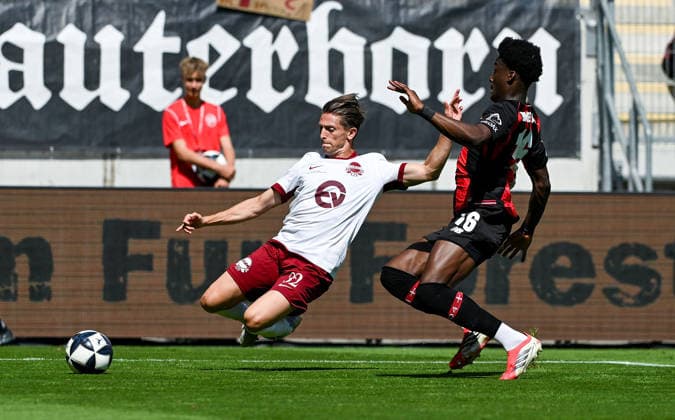 25.07.2026, xpsx, Fussball Testspiel, Kickers Offenbach - Bayer 04 Leverkusen v.l. Jan-Hendrik Marx (Offenbacher Kickers), Axel Tape (Bayer 04 Leverkusen) (DFL DFB REGULATIONS PROHIBIT ANY USE OF PHOTOGRAPHS as IMAGE SEQUENCES and or QUASI-VIDEO) emspor Offenbach *** July 25, 2026, xpsx, Soccer Friendly Match, Kickers Offenbach vs. Bayer 04 Leverkusen, Jan Hendrik Marx, Offenbacher Kickers, Axel Tape, Bayer 04 Leverkusen. DFL and DFB regulations prohibit any use of photographs as image sequences and or quasi-video. emspor Offenbach