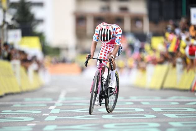 Ecuadorian Richard Carapaz of EF Education-EasyPost celebrates as he crosses the finish line to win stage 20 of the 2026 Tour de France cycling race, a stage of 171km Le Bourg d Oisans to Alpe d Huez, on Saturday 25 July 2026. The 113th edition of the Tour de France starts on Saturday 4 July in Barcelona, Spain, and will finish in Paris, France on the 26th of July. DAVIDxPINTENS  x182012478x