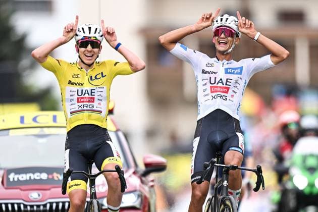 Slovenian Tadej Pogacar of UAE Team Emirates-XRG and Mexican Isaac Del Toro of UAE Team Emirates XRG celebrate as they cross the finish line at stage 20 of the 2026 Tour de France cycling race, a stage of 171km Le Bourg d Oisans to Alpe d Huez, on Saturday 25 July 2026. The 113th edition of the Tour de France starts on Saturday 4 July in Barcelona, Spain, and will finish in Paris, France on the 26th of July. DAVIDxPINTENS  x182013965x
