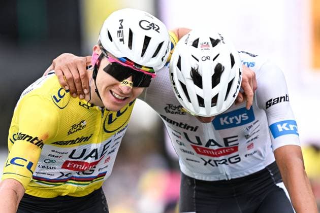 Slovenian Tadej Pogacar of UAE Team Emirates-XRG and Mexican Isaac Del Toro of UAE Team Emirates XRG celebrate as they cross the finish line at stage 20 of the 2026 Tour de France cycling race, a stage of 171km Le Bourg d Oisans to Alpe d Huez, on Saturday 25 July 2026. The 113th edition of the Tour de France starts on Saturday 4 July in Barcelona, Spain, and will finish in Paris, France on the 26th of July. DAVIDxPINTENS  x182014994x