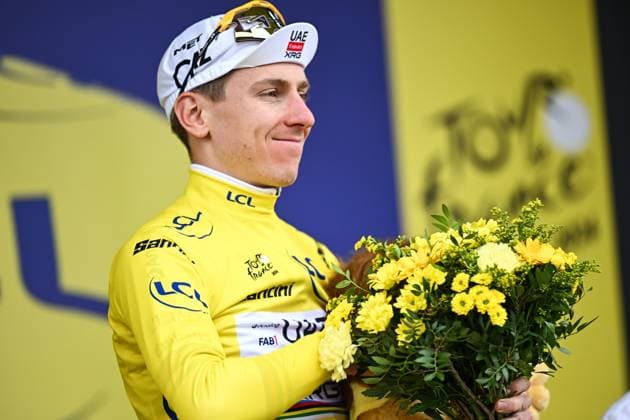 Slovenian Tadej Pogacar of UAE Team Emirates XRG celebrates on the podium in the yellow jersey of leader in the overall ranking after stage 20 of the 2026 Tour de France cycling race, a stage of 171km Le Bourg d Oisans to Alpe d Huez, on Saturday 25 July 2026. The 113th edition of the Tour de France starts on Saturday 4 July in Barcelona, Spain, and will finish in Paris, France on the 26th of July. DAVIDxPINTENS  x182016985x