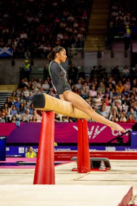 GLASGOW, SCOTLAND - JULY 25: Sureshni ANDREW of Namibia on the balance beam during the Artistic Gymnastics Women’s Team Final and Individual Qualification at The Arena, Glasgow on July 25, 2026 in Glasgow, Scotland. (Photo by Claire Jeffrey Sports Press Photo)  Copyright: xClairexJeffreyx xSPPx Sportspressphoto_SPR196232