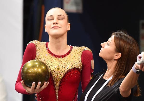 25.07.2026, xhbx, Turnen Rhythmische Sportgymnastik, Deutsche Meisterschaften 2026 v.l. Darja Varfolomeev (TSV Schmiden 1902) Übung mit dem Ball, Trainerin Julija Raskina (DFL DFB REGULATIONS PROHIBIT ANY USE OF PHOTOGRAPHS as IMAGE SEQUENCES and or QUASI-VIDEO) Hannover *** July 25, 2026, xhbx, Rhythmic Gymnastics, 2026 German Championships: Darja Varfolomeev, TSV Schmiden 1902, ball routine; coach Julija Raskina. DFL and DFB regulations prohibit any use of photographs as image sequences and or quasi-video. Hanover