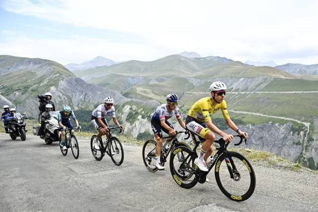 French Lenny Martinez of Bahrain Victorious, Mexican Isaac Del Toro of UAE Team Emirates XRG, Belgian Remco Evenepoel of Red Bull-BORA-hansgrohe and Slovenian Tadej Pogacar of UAE Team Emirates XRG pictured in action during stage 20 of the 2026 Tour de France cycling race, a stage of 171km Le Bourg d Oisans to Alpe d Huez, on Saturday 25 July 2026. The 113th edition of the Tour de France starts on Saturday 4 July in Barcelona, Spain, and will finish in Paris, France on the 26th of July. JASPERxJACOBS  x182023054x