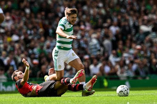 James Forrest of Celtic is tackled by Matteo Gabbia of AC Milan during the pre season friendly match between Celtic and AC Milan at Celtic Park, Glasgow, Scotland on Saturday 25th July 2026. Celtic v AC Milan, Pre Season Friendly, Football, Celtic Park, Glasgow, Scotland, UK - 25 Jul 2026Glasgow Celtic Park United Kingdom  Copyright: xAndyxBuchanan Shutterstockx 17004340av