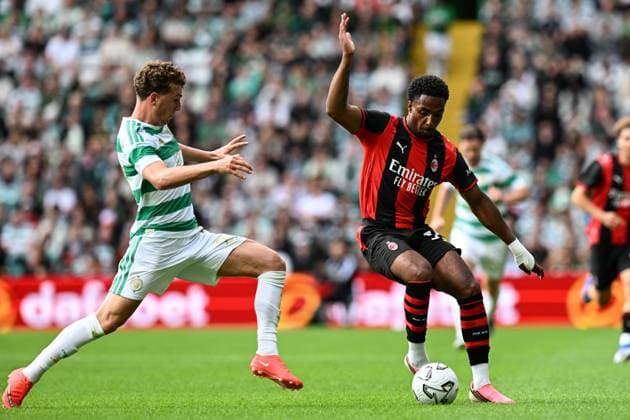 Arne Engels of Celtic vies with Silvano Vos of AC Milan during the pre season friendly match between Celtic and AC Milan at Celtic Park, Glasgow, Scotland on Saturday 25th July 2026. Celtic v AC Milan, Pre Season Friendly, Football, Celtic Park, Glasgow, Scotland, UK - 25 Jul 2026Glasgow Celtic Park United Kingdom  Copyright: xAndyxBuchanan Shutterstockx 17004340dt