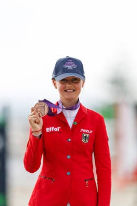 HAGEN a.T.W. - FEI Jumping European Championship, EM, Europameisterschaft Children, Juniors and Young Rider 2026, HAGEN a.T.W. - FEI Jumping European Championship Children, Juniors and Young Rider 2026 OSING Mila (GER) Championship ceremony Final Individual Einzelfinale CH-EU-Ch-S - Children Final Individuals over two rounds - SECOND ROUND Hagen a.T.W., Reitanlage Haunhorst 25. July 2026 - *** HAGEN a T W FEI Jumping European Championship for Children, Juniors, and Young Riders 2026, HAGEN a T W FEI Jumping European Championship for Children, Juniors, and Young Riders 2026 OSING Mila GER Championship Ceremony Final Individual Children’s Final over two rounds SECOND ROUND Hagen a T W, Haunhorst Equestrian Center, July 25, 2026