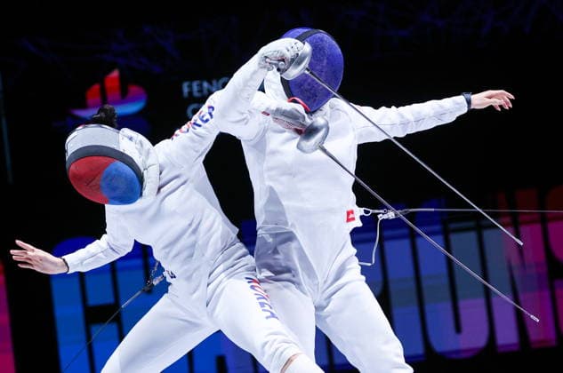 CHINA, HONG KONG - JULY 25, 2026: South Korea s Song Se-ra (L) and China s Tang Junyao compete in the ladies individual epee event at the 2026 Kerry Fencing World Championships. Mikhail Sinitsyn TASS  95441250