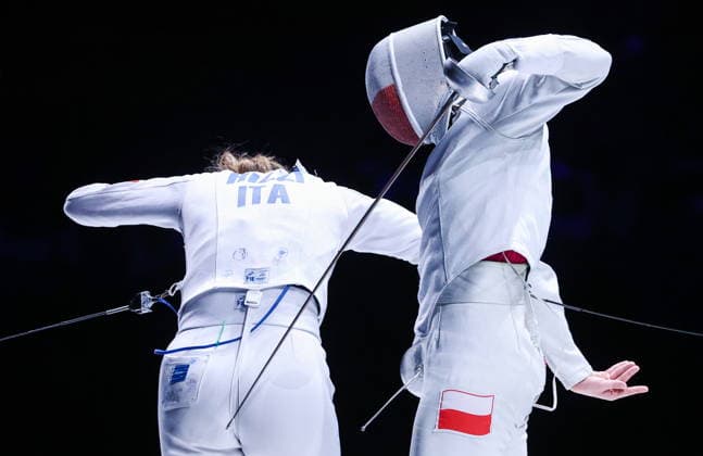 CHINA, HONG KONG - JULY 25, 2026: Italy s Giulia Rizzi (L) and Poland s Barbara Brych compete in the ladies individual epee event at the 2026 Kerry Fencing World Championships. Mikhail Sinitsyn TASS  95440963