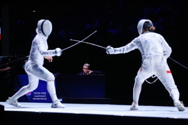 CHINA, HONG KONG - JULY 25, 2026: Italy s Giulia Rizzi (L) and Poland s Barbara Brych compete in the ladies individual epee event at the 2026 Kerry Fencing World Championships. Mikhail Sinitsyn TASS  95440960