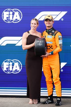 July 25, 2026, Budapest, Hungary: Lando Norris of McLaren and Michelle Gulyas pose for a picture after qualifying ahead Formula 1 Hungarian Grand Prix at the Hungaroring circuit in Mogyorod near Budapest on July 25th, 2026. F1 2026: Hungarian Grand Prix  - ZUMAz156 0862649521st Copyright: xBeataxZawrzelx
