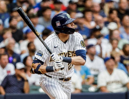 Milwaukee Brewers designated hitter Christian Yelich hits a double in the fifth inning of the MLB, Baseball Herren, USA game between the Colorado Rockies and the Milwaukee Brewers at American Family Field in Milwaukee, Wisconsin on Saturday July 25, 2026.  MIL20260725816 TANNENxMAURY