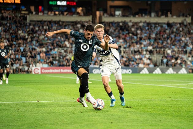 Minnesota United FC (USA) playing against Vancouver Whitecaps FC (USA) in the MLS, Fussball Herren, USA in Minneapolis at the Allianz Field on July 25th 2026, regular season 2026 Tomas Chancalay (Minnesota United FC, 08) im Zweikampf mit Mihail Gherasimencov (Vancouver Whitecaps FC, 29) Minneapolis Allianz Field Minnesota United States of America *** Minnesota United FC (USA) playing against Vancouver Whitecaps FC (USA) in the MLS in Minneapolis at Allianz Field on July 25, 2026, during the 2026 regular season. Tomas Chancalay of Minnesota United FC, No. 08, in a tackle with Mihail Gherasimencov of Vancouver Whitecaps FC, 29, Minneapolis, Allianz Field, Minnesota, United States of America