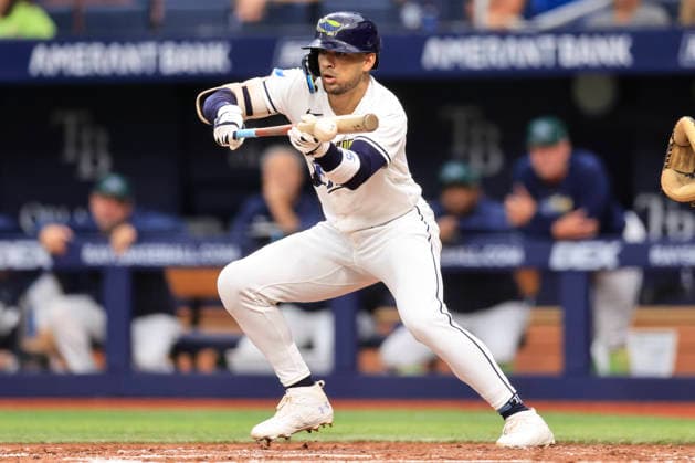 July 25, 2026, St. Petersburg, Florida, USA: Tampa Bay Rays right fielder Victor Mesa Jr. (25) singles on a bunt at Cleveland Guardians starting pitcher Tanner Bibee (28) and moves left fielder Chandler Simpson (14) to second base during an MLB, Baseball Herren, USA game on July 25, 2026 at Tropicana Field. The Rays beat the Guardians 3-0. St. Petersburg USA - ZUMAh180 20260725_zsp_h180_041 Copyright: xKimxHukarix