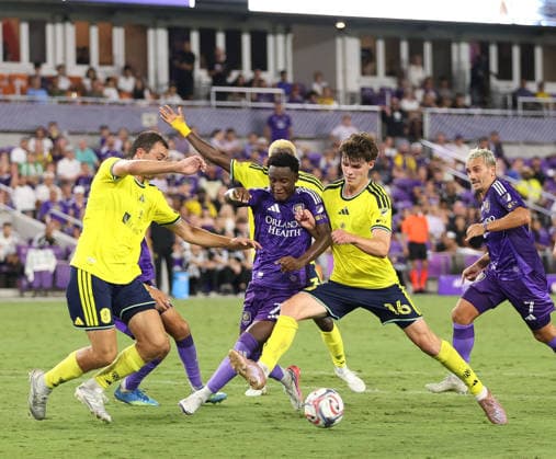 July 25, 2026, Orlando, Florida, USA: Orlando City SC midfielder IVoÂN ANGULO (77) works the ball through Nashville SC defense. Orlando City SC hosted Nashville SC at Inter.Co Stadium in Orlando, FL. Orlando USA - ZUMAm299 20260725_znp_m299_031 Copyright: xTaylorxMcFeex