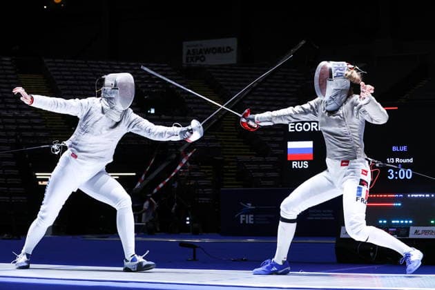 CHINA, HONG KONG - JULY 26, 2026: Russia s Yana Yegoryan (L) and France s Manon Apithy compete in the ladies individual sabre event at the 2026 Kerry Fencing World Championships 2026 Fencing World Championships In Hong Kong  - ZUMAt113 20260726_zaa_t113_010 Copyright: xMikhailxSinitsynx
