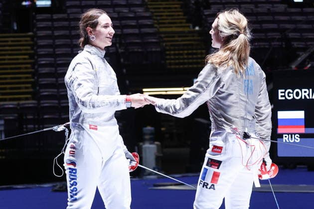 CHINA, HONG KONG - JULY 26, 2026: Russia s Yana Yegoryan (L) and France s Manon Apithy compete in the ladies individual sabre event at the 2026 Kerry Fencing World Championships 2026 Fencing World Championships In Hong Kong  - ZUMAt113 20260726_zaa_t113_016 Copyright: xMikhailxSinitsynx