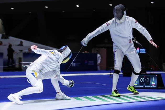CHINA, HONG KONG - JULY 26, 2026: Ukraine s Roman Svichkar (L) and Russia s Dmitry Shvelidze compete in the men s individual epee event at the 2026 Kerry Fencing World Championships 2026 Fencing World Championships In Hong Kong  - ZUMAt113 20260726_zaa_t113_046 Copyright: xMikhailxSinitsynx