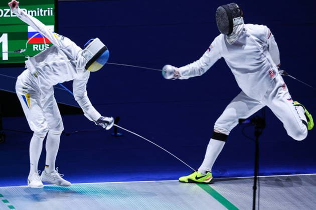 CHINA, HONG KONG - JULY 26, 2026: Ukraine s Roman Svichkar (L) and Russia s Dmitry Shvelidze compete in the men s individual epee event at the 2026 Kerry Fencing World Championships. Mikhail Sinitsyn TASS  95477724