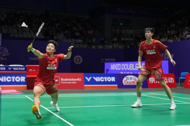 (260726) -- CHANGZHOU, July 26, 2026 -- Feng Yanzhe Huang Dongping (L) compete during the mixed doubles final match between Feng Yanzhe Huang Dongping and Guo Xinwa Chen Fanghui of China at the 2026 China Open badminton tournament in Changzhou, east China s Jiangsu Province, July 26, 2026. ) (SP)CHINA-CHANGZHOU-BADMINTON-CHINA OPEN-MIXED DOUBLES-FINAL (CN) SunxFei 
