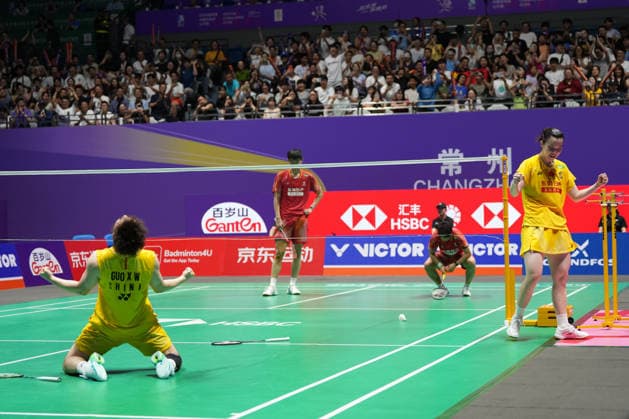 (260726) -- CHANGZHOU, July 26, 2026 -- Guo Xinwa (1st L) Chen Fanghui (1st R) celebrate after winning the mixed doubles final match between Feng Yanzhe Huang Dongping and Guo Xinwa Chen Fanghui of China at the 2026 China Open badminton tournament in Changzhou, east China s Jiangsu Province, July 26, 2026. ) (SP)CHINA-CHANGZHOU-BADMINTON-CHINA OPEN-MIXED DOUBLES-FINAL (CN) SunxFei 