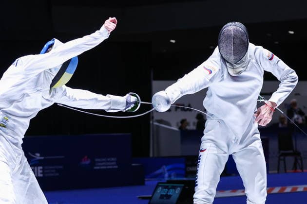CHINA, HONG KONG - JULY 26, 2026: Ukraine s Roman Svichkar (L) and Russia s Dmitry Shvelidze compete in the men s individual epee event at the 2026 Kerry Fencing World Championships 2026 Fencing World Championships In Hong Kong  - ZUMAt113 20260726_zaa_t113_072 Copyright: xMikhailxSinitsynx