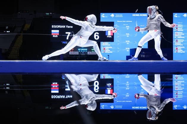 CHINA, HONG KONG - JULY 26, 2026: Russia s Yana Yegoryan (L) and France s Manon Apithy compete in the ladies individual sabre event at the 2026 Kerry Fencing World Championships. Mikhail Sinitsyn TASS  95478239