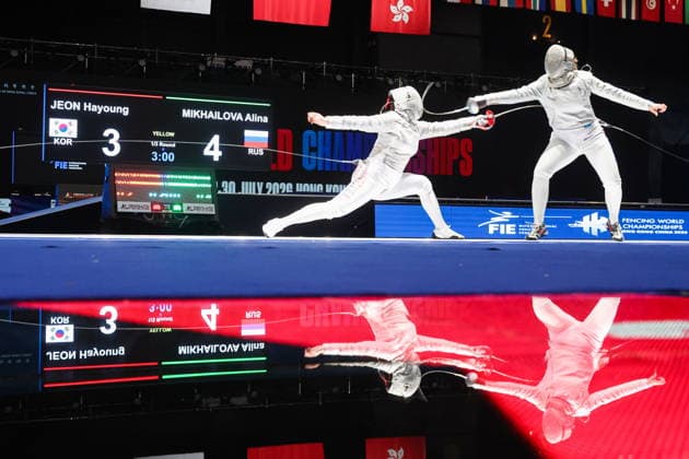 CHINA, HONG KONG - JULY 26, 2026: South Korea s Jeon Ha-young (L) and Russia s Alina Mikhailova compete in the ladies individual sabre event at the 2026 Kerry Fencing World Championships 2026 Fencing World Championships In Hong Kong  - ZUMAt113 20260726_zaa_t113_117 Copyright: xMikhailxSinitsynx