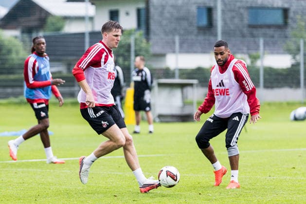 ST. JOHANN IN TIROL, AUSTRIA - JULY 26: Marius Buelter (Bülter, Bulter, 1. FC Koeln, 30) controls the ball against Linton Maina (1. FC Koeln, 37) during a training session at trainings camp in Kitzbuehel of season 2026 27 at Koasastadion on July 26, 2026 in St. Johann in Tirol, Austria. Austria Copyright: xSteffiexWunderlx