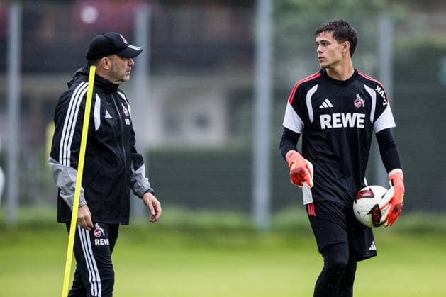 ST. JOHANN IN TIROL, AUSTRIA - JULY 26: Peter Greiber (Goalkeeper Coach 1. FC Koeln) talking to Martin James (1. FC Koeln) during a training session at trainings camp in Kitzbuehel of season 2026 27 at Koasastadion on July 26, 2026 in St. Johann in Tirol, Austria. Austria Copyright: xSteffiexWunderlx