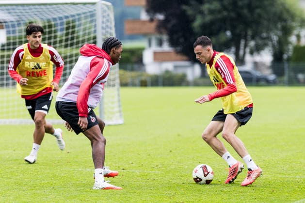 ST. JOHANN IN TIROL, AUSTRIA - JULY 26: Paul Okon-Engstler (1. FC Koeln, 23) controls the ball against Reigan Heskey (1. FC Koeln, 11) during a training session at trainings camp in Kitzbuehel of season 2026 27 at Koasastadion on July 26, 2026 in St. Johann in Tirol, Austria. Austria Copyright: xSteffiexWunderlx