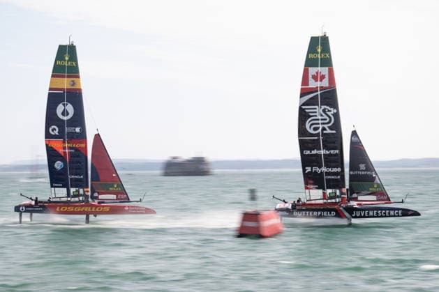 Canada Sail GP with Giles Scott as driver lead Spain lead by driver Diego Botin and wing trimmer Florian Trittel during the Emirates GB SailGP at The Solent, Portsmouth, UK on 25 July 2026. Copyright: xPhilxHutchinsonx 45300037