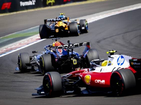 BUDAPEST - Lando Norris (McLaren), Max Verstappen (Red Bull Racing) and Lewis Hamilton (Ferrari) during the race at the Hungaroring for the Hungarian Grand Prix. SANDER KONING ANP xVIxANPxSportx xxANPxIVx 564335229 originalFilename: 564335229.jpg