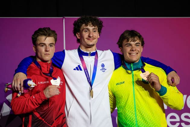 , 2026 Commonwealth Games Reuben Ward (SCO) with the gold medal in the Men™s all-round gymnastics competition with Felix Dolci (CAN) and Jesse Moore (AUS) during the 2026 Commonwealth Games at The Glasgow International Arena, Glasgow, UK on 26 July 2026. Glasgow Glasgow International Arena Lanarkshire UK Editorial use only , Copyright: xConorxMolloyx PSI-24577-0010