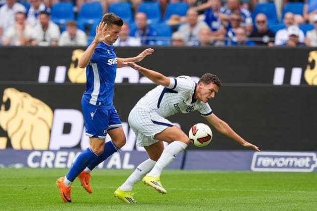 26.07.2026, xydrx, Fußball, Testspiel, Saisoneröffnung, Karlsruher SC - Inter Mailand, Saison 2026 2027, BBBank Wildpark: Marvin Wanitzek (Karlsruher SC, 10) im Zweikampf gegen Benjamin Jacques Marcel Pavard (Inter Mailand, 28) DFB regulations prohibit any use of photographs as image sequences and or quasi-video. *** July 26, 2026, xydrx, soccer, friendly match, season opener, Karlsruher SC vs. Inter Milan, 2026–2027 season, BBBank Wildpark, Marvin Wanitzek (Karlsruher SC), No. 10 in a tackle against Benjamin Jacques and Marcel Pavard (Inter Milan), 28. DFB regulations prohibit any use of photographs as image sequences and or quasi-video Copyright: HMBxMedia YannisxDreimann