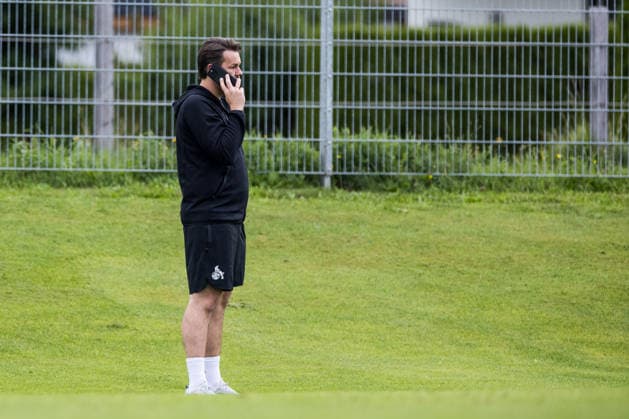 ST. JOHANN IN TIROL, AUSTRIA - JULY 26: Thomas Kessler (Sports Director 1. FC Koeln) on the phone during a training session at trainings camp in Kitzbuehel of season 2026 27 at Koasastadion on July 26, 2026 in St. Johann in Tirol, Austria. Austria Copyright: xSteffiexWunderlx