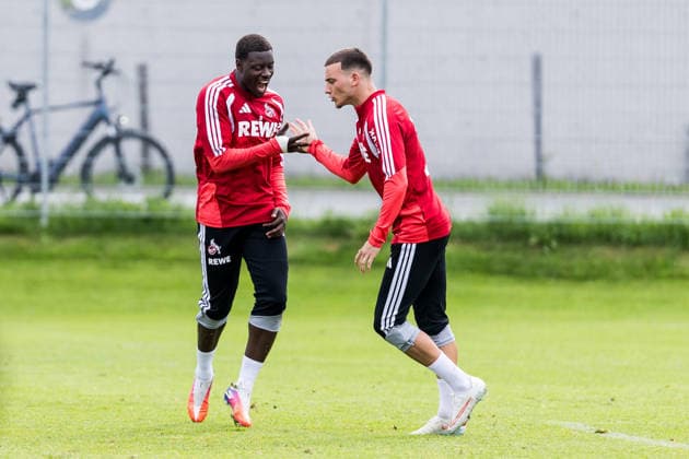 ST. JOHANN IN TIROL, AUSTRIA - JULY 26: Ragnar Ache (1. FC Koeln, 9) and Said El Mala (1. FC Koeln, 13) cheering together during a training session at trainings camp in Kitzbuehel of season 2026 27 at Koasastadion on July 26, 2026 in St. Johann in Tirol, Austria. Austria Copyright: xSteffiexWunderlx