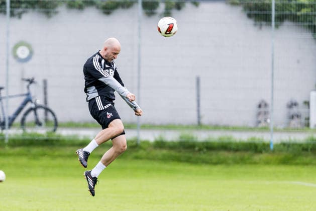 ST. JOHANN IN TIROL, AUSTRIA - JULY 26: Rene Wagner (Head Coach 1. FC Koeln) controls the ball via header during a training session at trainings camp in Kitzbuehel of season 2026 27 at Koasastadion on July 26, 2026 in St. Johann in Tirol, Austria. Austria Copyright: xSteffiexWunderlx