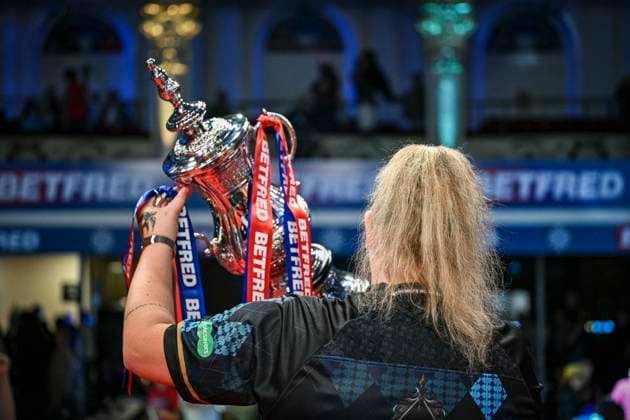 RECORD DATE NOT STATED 26th July 2026, Winter Gardens, Blackpool, Lancashire, England; 2026 Betfred Womens World Matchplay Darts, Final Day; Beau Greaves holds the Womens World Matchplay trophy up towards the fans after beating Fallon Sherrock in the final GodfreyxPitt