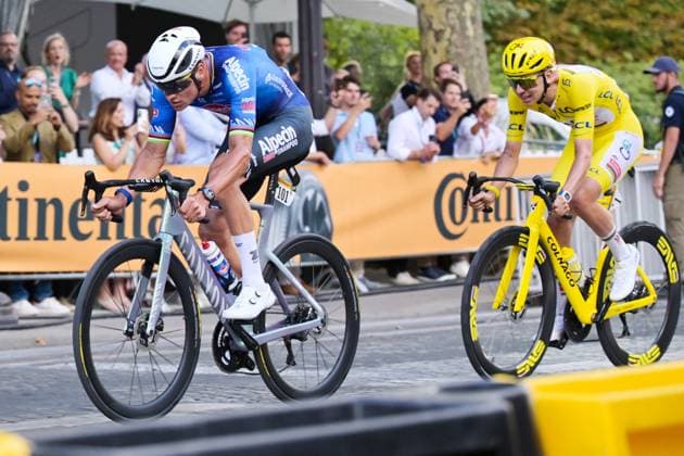 Dutch Mathieu van der Poel of Alpecin-Premier Tech and Slovenian Tadej Pogacar of UAE Team Emirates XRG pictured in action during stage 21 of the 2026 Tour de France cycling race, a stage of 130km from Thoiry to Paris Champs-Elysees , on Sunday 26 July 2026. The 113th edition of the Tour de France starts on Saturday 4 July in Barcelona, Spain, and will finish in Paris, France on the 26th of July. DAVIDxPINTENS  x182104264x