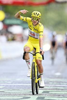 Slovenian Tadej Pogacar of UAE Team Emirates-XRG celebrate after stage 21 of the 2026 Tour de France cycling race, a stage of 130km from Thoiry to Paris Champs-Elysees , on Sunday 26 July 2026. The 113th edition of the Tour de France starts on Saturday 4 July in Barcelona, Spain, and will finish in Paris, France on the 26th of July. JASPERxJACOBS  x182104551x