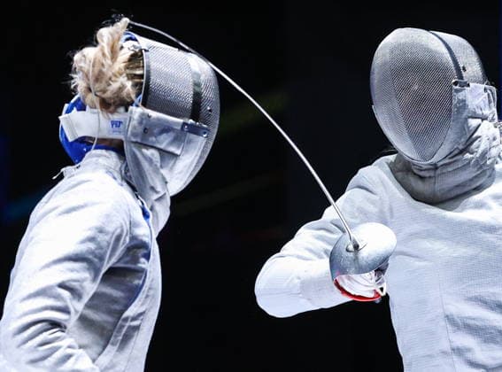 CHINA, HONG KONG - JULY 26, 2026: Hungary s Sugar Katinka Battai (L) and Russia s Alina Mikhailova compete in the ladies individual sabre event at the 2026 Kerry Fencing World Championships 2026 Fencing World Championships In Hong Kong  - ZUMAt113 20260726_zaa_t113_457 Copyright: xMikhailxSinitsynx