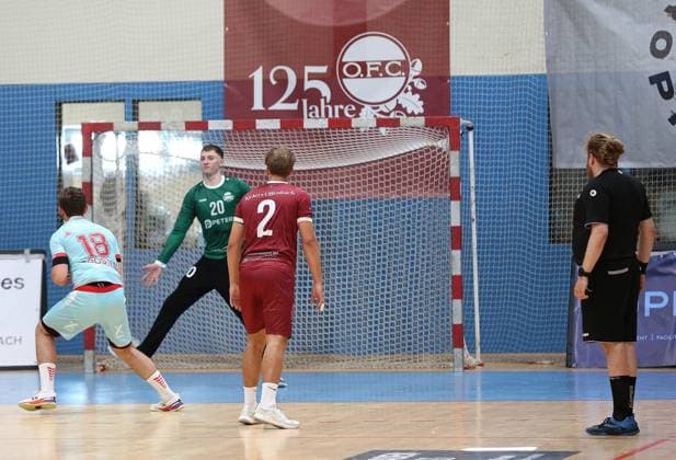 26-07.2026 xmgoodx Offenbach, Handball Männer - 125 Jahre OFC Jubliäumsspiel OFC Kickers gegen MT Melsungen Florian Drosten (18, MT Melsungen) gegen Torwart Schüler, Luis OFC *** July 26, 2026 xmgoodx Offenbach, Men s Handball: OFC s 125th Anniversary Match—OFC Kickers vs. MT Melsungen; Florian Drosten, 18, MT Melsungen vs. Goalkeeper Schüler, Luis, OFC