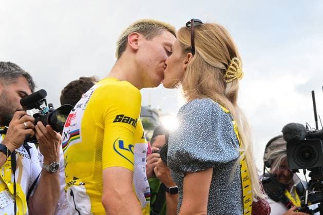 Slovenian Tadej Pogacar and his partner Urska Zigart are pictured after stage 21 of the 2026 Tour de France cycling race, a stage of 130km from Thoiry to Paris Champs-Elysees , on Sunday 26 July 2026. The 113th edition of the Tour de France starts on Saturday 4 July in Barcelona, Spain, and will finish in Paris, France on the 26th of July. DAVIDxPINTENS  x182106629x